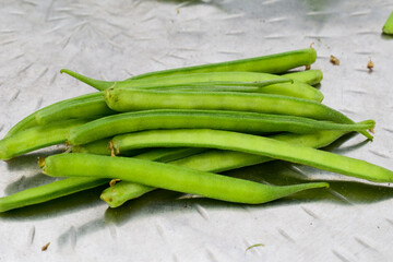 Fresh green organic cluster (guvar) beans vegetable