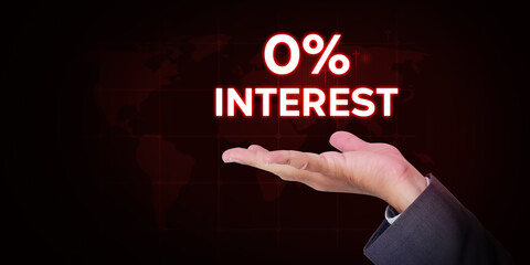 Zero percent Interest rate loans concept background with glowing text on hand. Finance and loan wallpaper