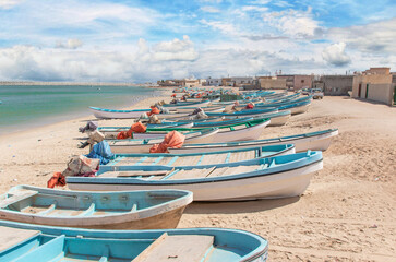 Fototapeta na wymiar Muscat, Oman - surrounded by the green waters of the arabic sea, Oman displays dozens of wonderful seaside villages, many of them inhabited mostly by fisherman 