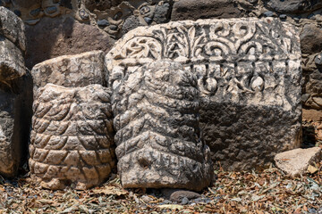 Variety of carved architectural features from the ruins at Capernaum, Kfar Nahum, Capharnaum in Israel
