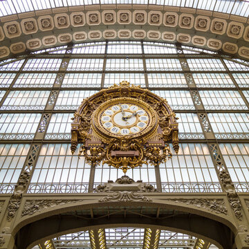 Paris, France, March 28 2017: Golden clock of the museum D'Orsay.The Musee d'Orsay is a museum in Paris, on the left bank of the Seine