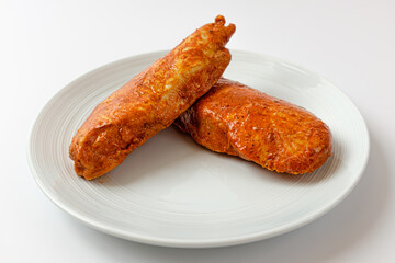 Tandoori chicken breast on white background