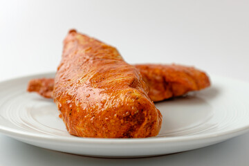 Tandoori chicken breast on white background