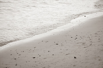 Monochrome or black and white of beach scene. Light and shadow of sea water. Surface and texture background.