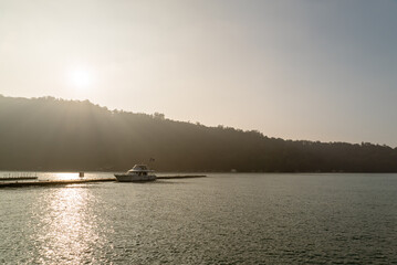 Cruise boat under sunset river ocean sea