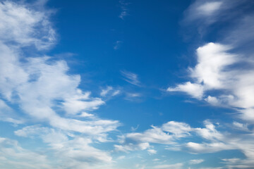 Naklejka na ściany i meble Beautiful sky with bright clouds for background