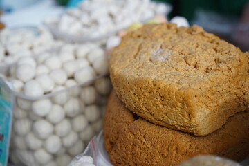 Almaty, Kazakhstan - 03.25.2022 : Sour-milk and cheese products are placed for sale in an open market.