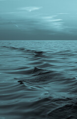 Waves created behind a boat going out to sea