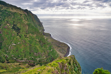 A Panoramic view of Achadas da Cruz on the west coast of Madeiram, seen from the Miradouro do Ponta da Ladeira viewpoint