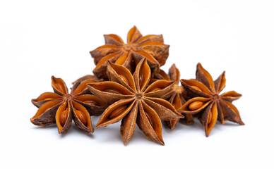 Star anise on a white background isolated. Indian spices close up. Medicinal herbs and spices.