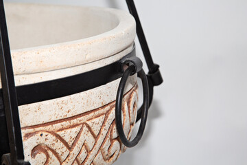 tandoor oven for barbecue and roasting meat made of clay and various drawings with skewers and with...