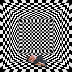 Contemporary art collage. Sad young woman with depression lying in cube with black and white...