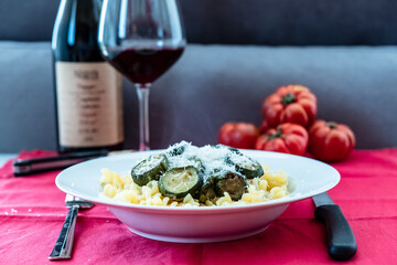 Italian food: pasta with zucchini and parmesan