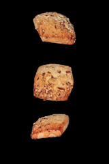 Freshly baked chocolate chips cookies isolated on black background. macro. close up.