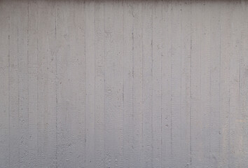 Front view of plain gray concrete wall. High resolution full frame abstract textured background. Copy space.