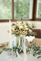 wedding table decor and the bride's bouquet