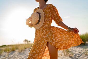 stylish attractive slim woman on beach in summer style fashion trend outfit