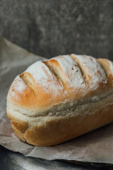 Homemade, fresh bread cools down after baking. Selective focus. place for text