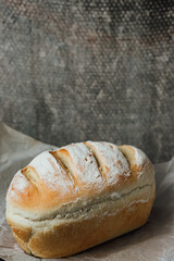 Homemade, fresh bread cools down after baking. Selective focus. place for text