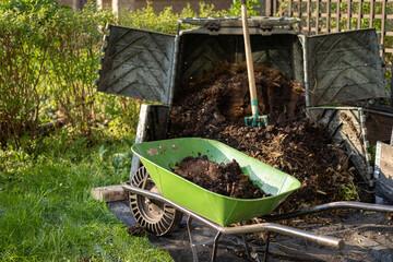 Ready made compost soil in wheelbarrow for next use
