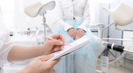Gynecologist woman talk consultation with young female patient during medical in modern clinic