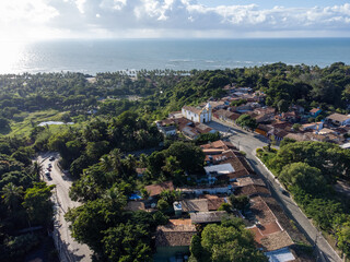 Fototapeta na wymiar historic center of tourist town Arraial D'Ajuda, Bahia, Brazil - summer aerial Drone View
