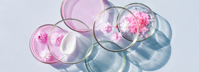 banner petri dish with cosmetic samples on a light background	
