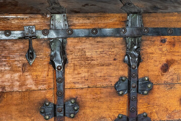 An old wooden chest with metal fittings