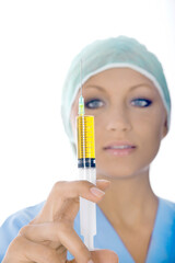 Nurse with Injection Against Isolated White Background