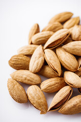 fresh almonds in shell on a white background