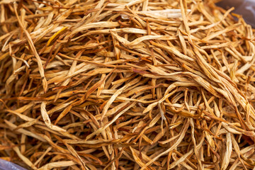 A pile of dried day lilies close-up