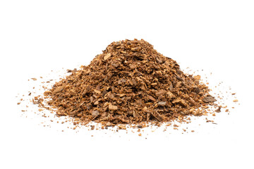 Lots of sawdust or wood chips piled up on a white background.