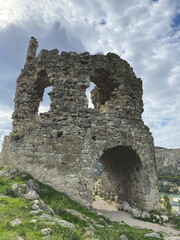 a very ancient dilapidated stone fortress made of untreated stones