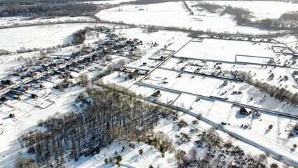 view from the height of the village with streets in winter. High quality photo