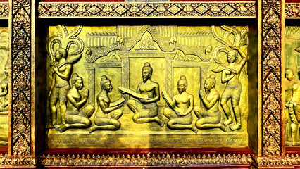 18 April 2022, Goldend wall with Khmer Empire concept at  Wat Taing Kork, Kampong Thom Province, 50's architecture. Located Tang Kork District, Kampong Thom Province, Cambodia.