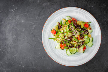 delicious fresh beef salad on a black background