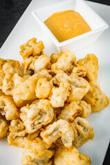 deep fried tempura vegetables on a dark background