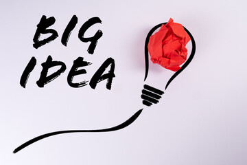 Big Idea concept. Text and abstract light bulb on a white background