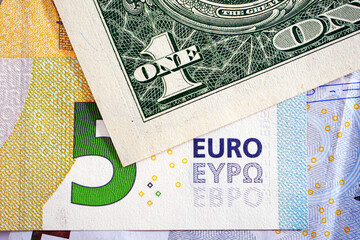 Macro top view on dollar and euro banknotes