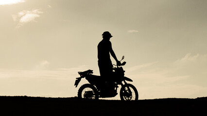 Fototapeta na wymiar Tourists with motorcycles, motocross. Adventure tourists on motorcycles. men's holiday event ideas