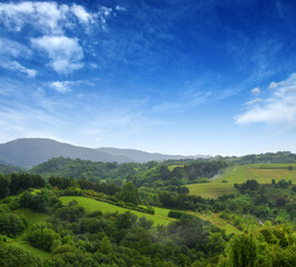 The hills in the fog.