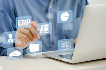 Businessman touching on virtual screen icon business ERP. Enterprise Resource Planning ERP document management concept