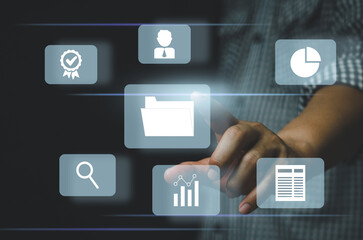 Businessman  touching on icons on virtual screen Enterprise Resource Planning ERP document management.Document Management System DMS concept.
