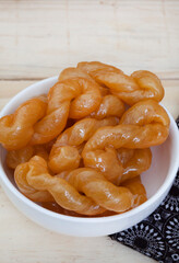 Delicious golden, syrup drenched South African traditional koeksisters