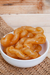 Delicious golden, syrup drenched South African traditional koeksisters