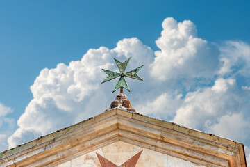 Closeup of a Maltese Cross or Cross of Saint John, Church of St. Stephen of the Knights (Chiesa di...