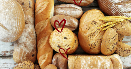 Image of falling read hearts over bread