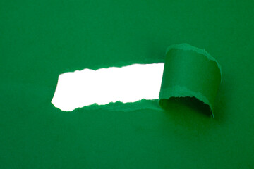 Green torn paper hole space for text background