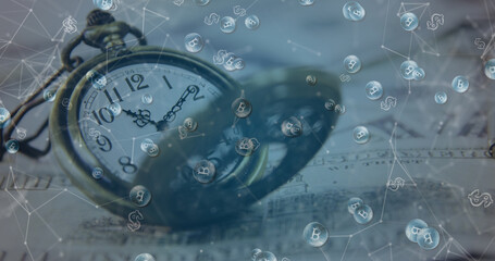 Image of bitcoin symbol over banknotes