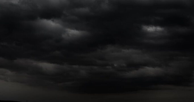 Beautiful cloudscape above the on the beautiful bright sky thunderstorm cloud landscapes wind turbine silhouette cloud background